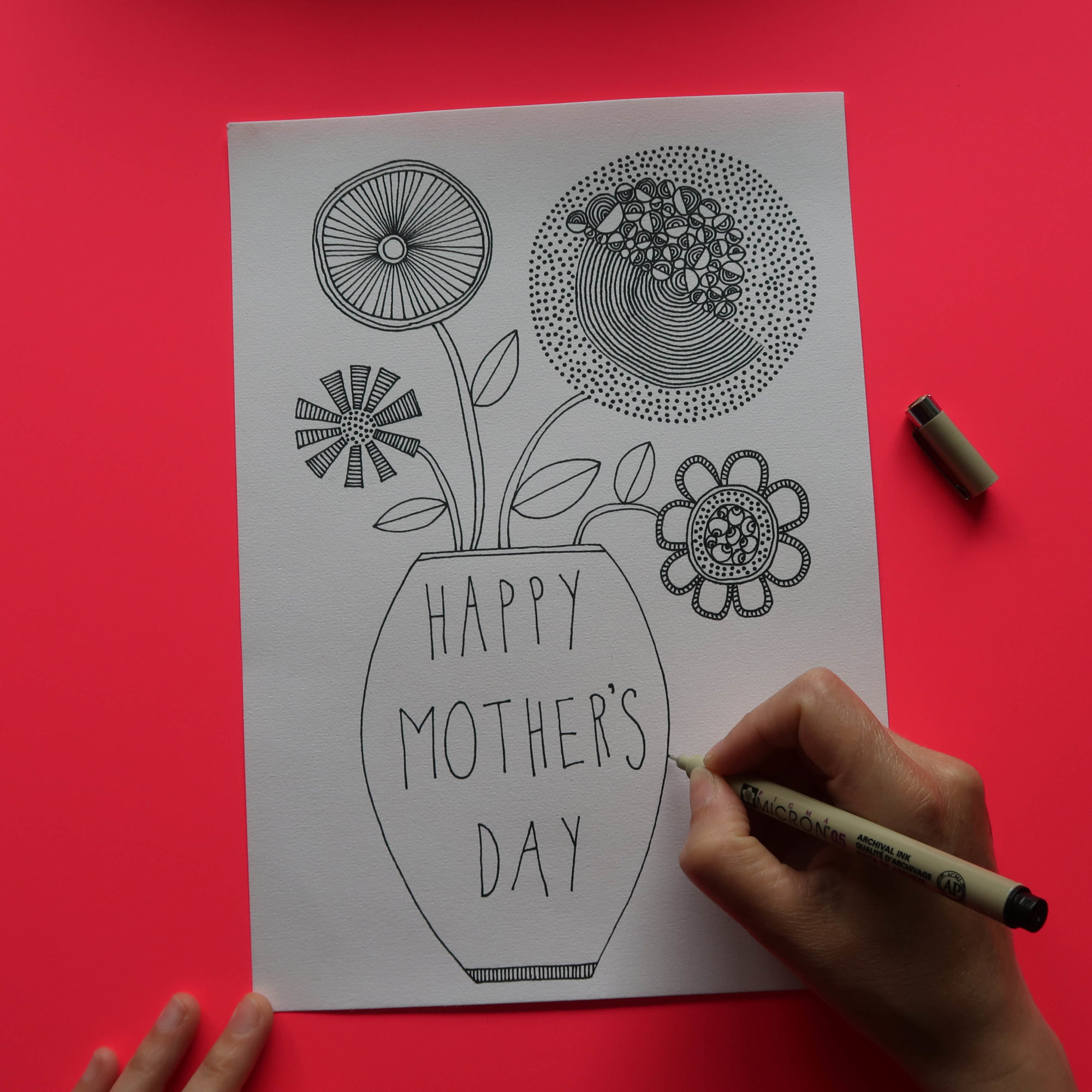 Drawing with micron pen of a vase with flowers for mother's day